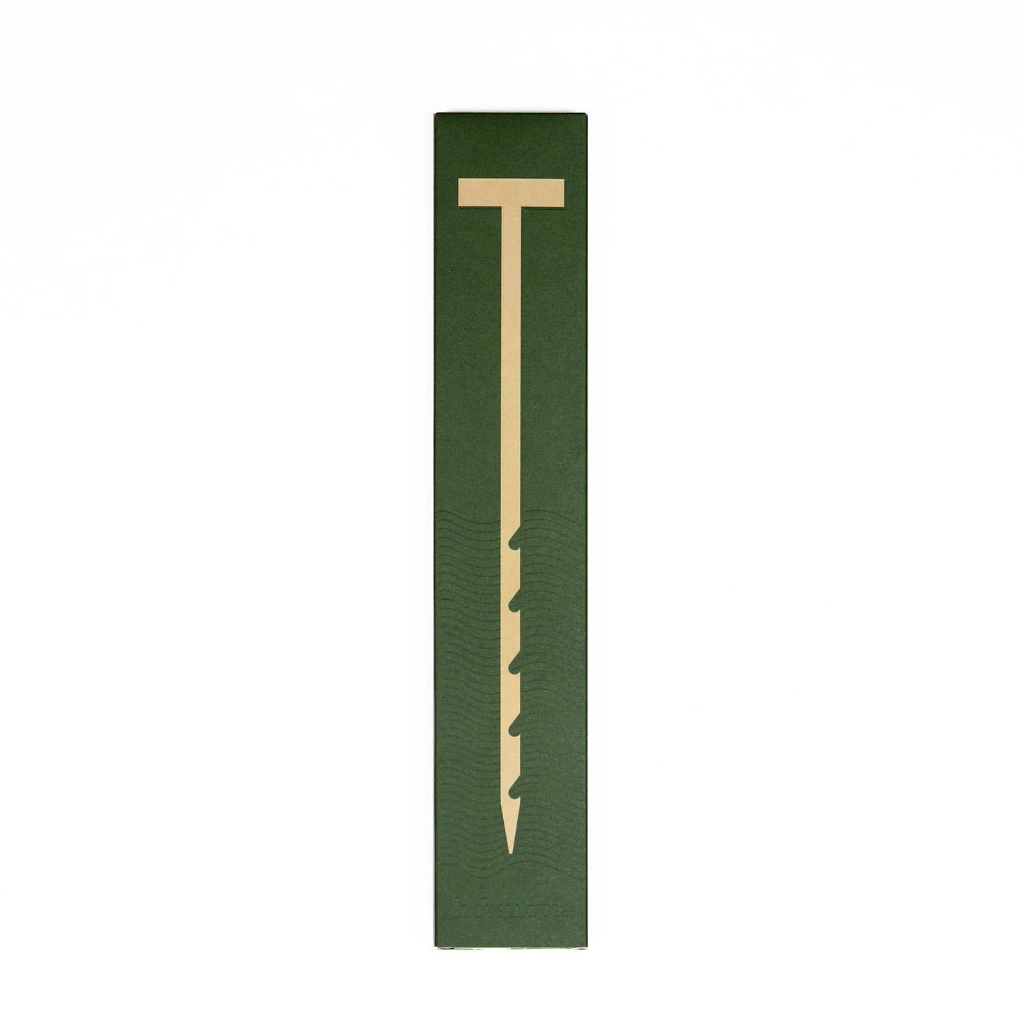 Green packaging with a beige t-shaped object on a white background