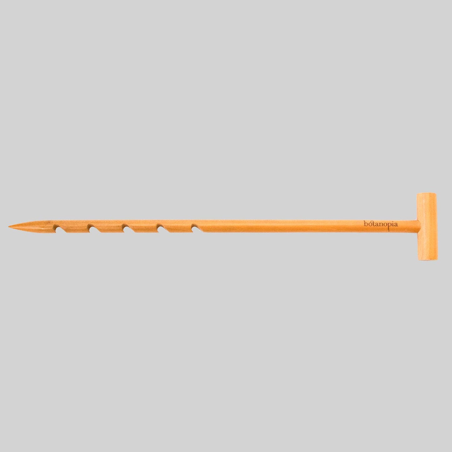 Orange garden tool with brand name on a gray background