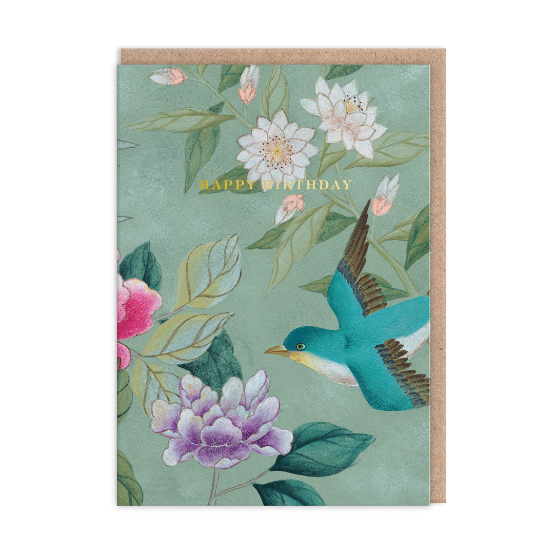 Greeting card with floral design and bird illustration on a light green background