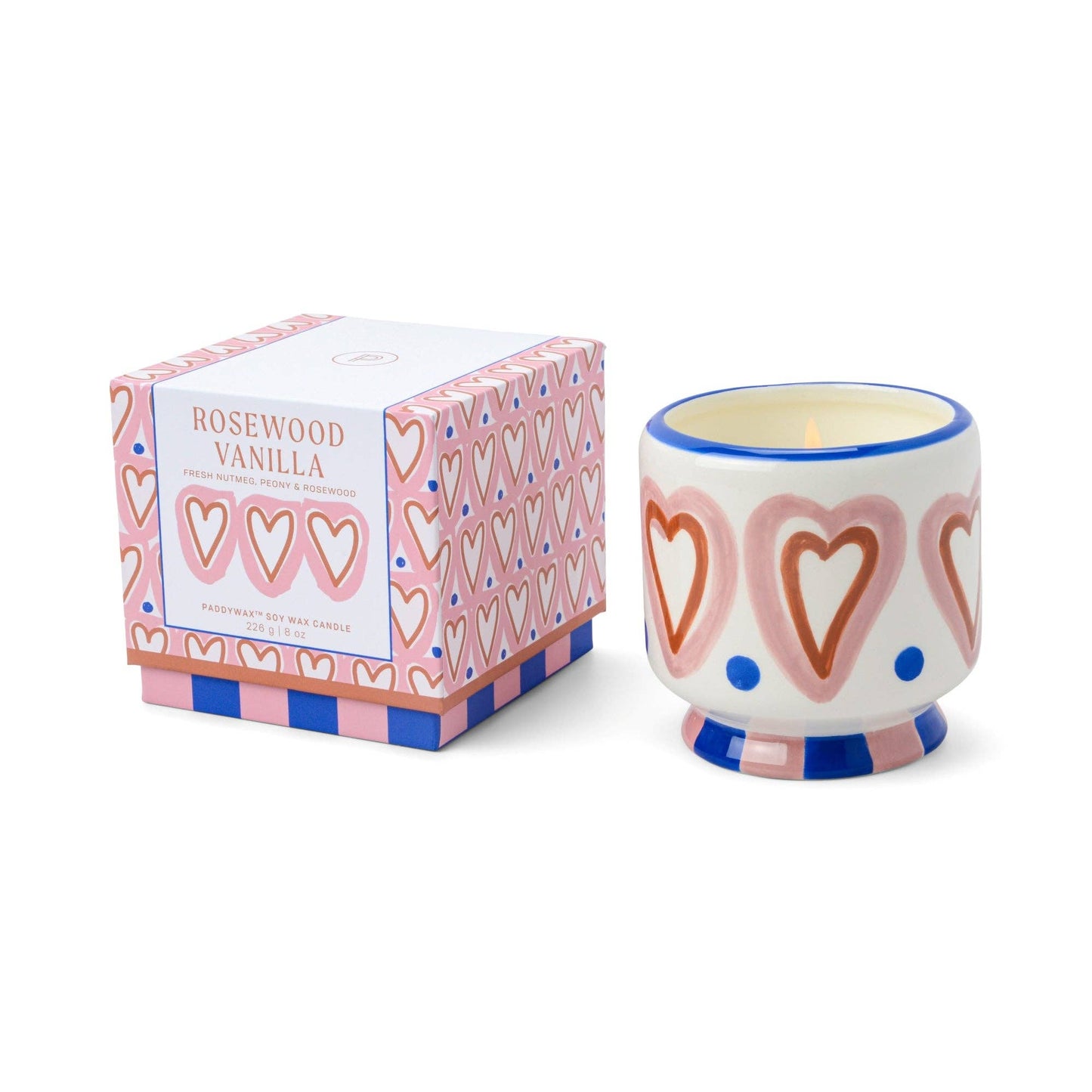 Ceramic candle with heart design and matching box on a white background