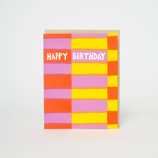 Colorful checkered birthday card with 'Happy Birthday' text on a white background