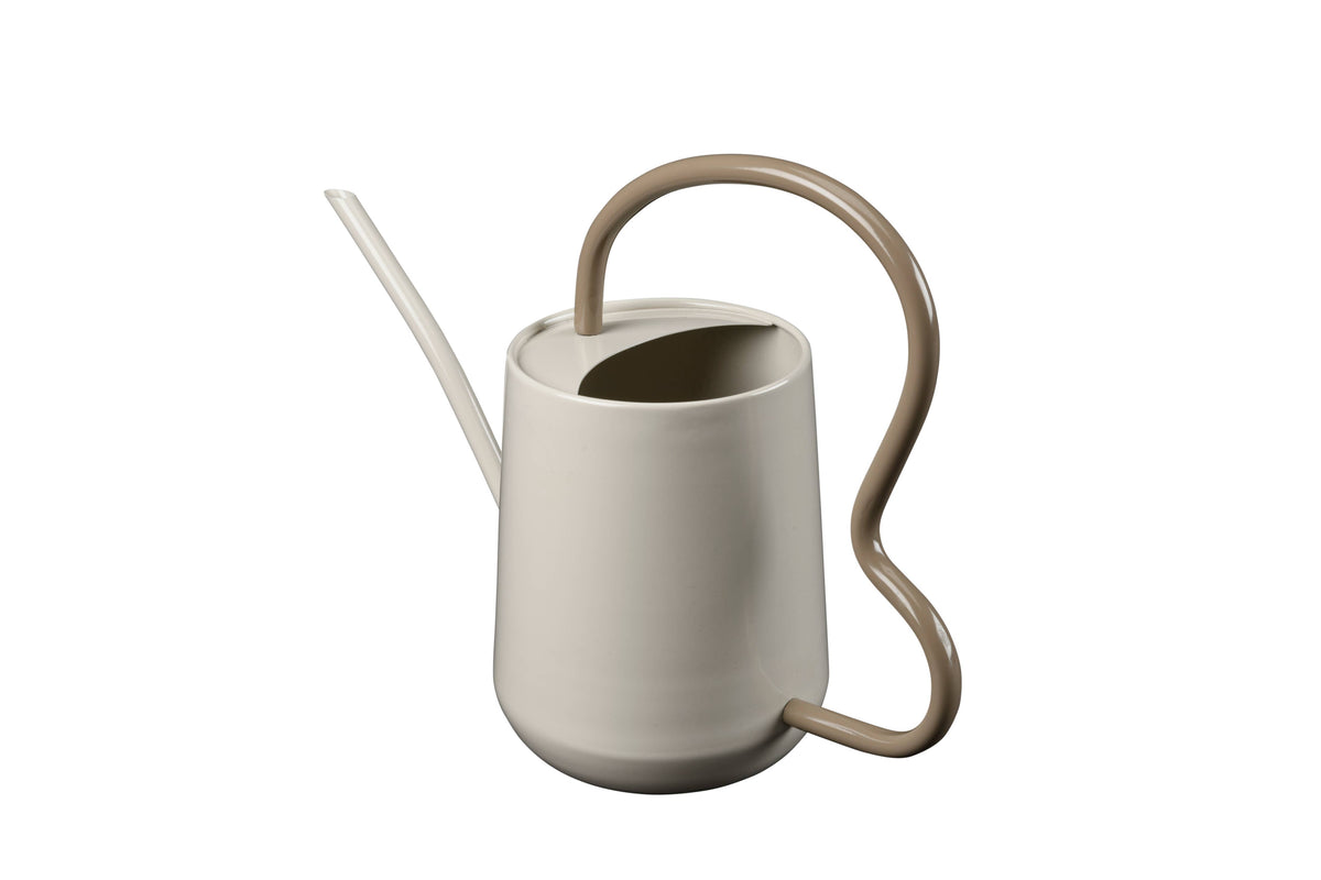 Beige watering can on a white background