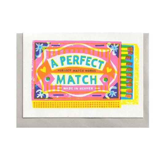 Colorful card with 'A Perfect Match' text on a white background