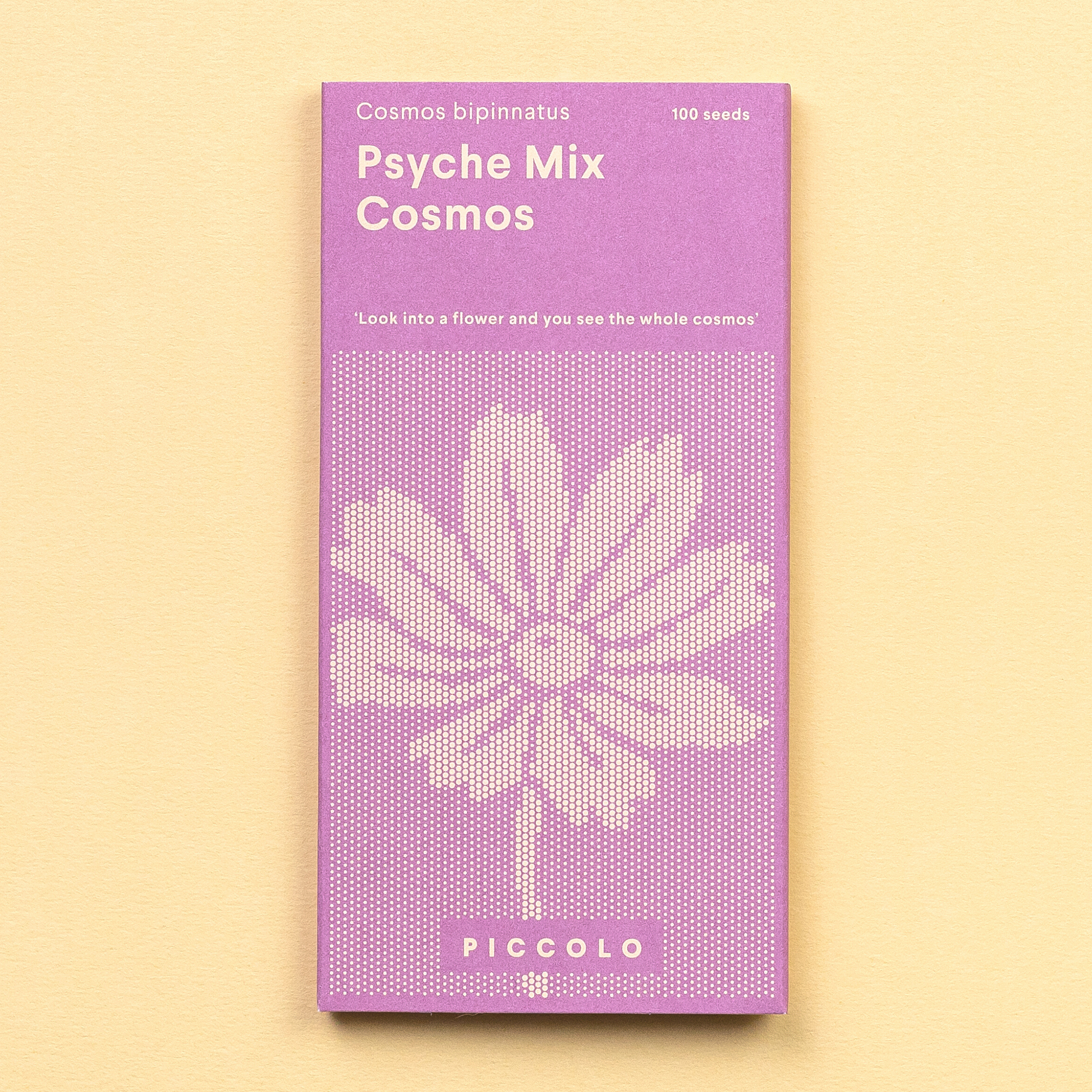 Purple packet of Piccolo Psyche Mix Cosmos seeds on a beige background