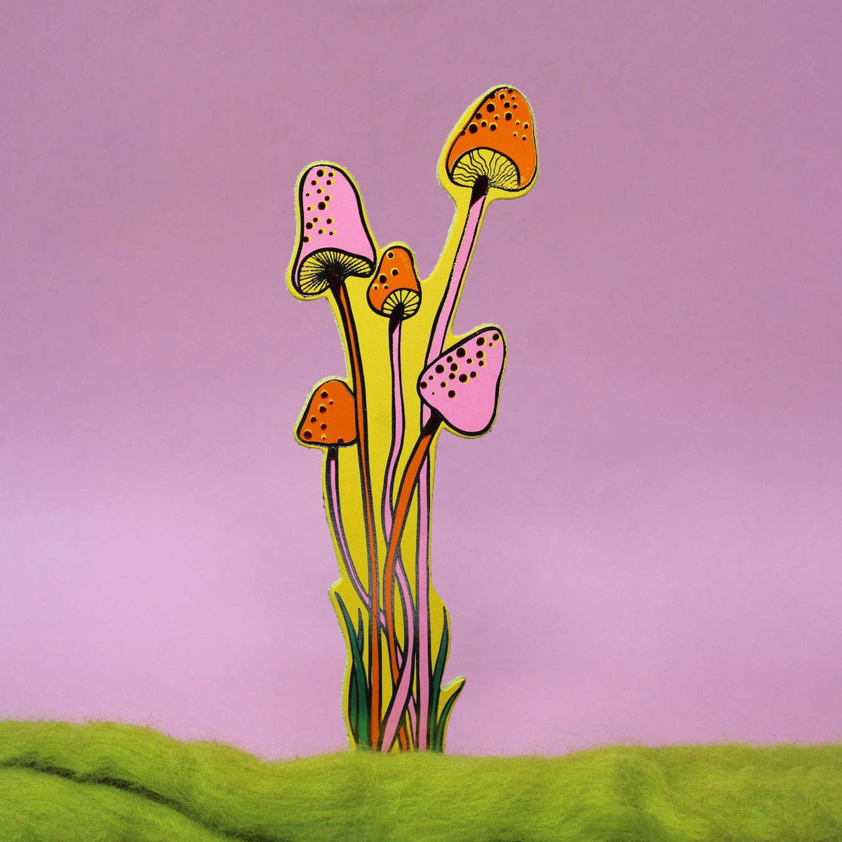 Colorful mushroom illustration on a pink background