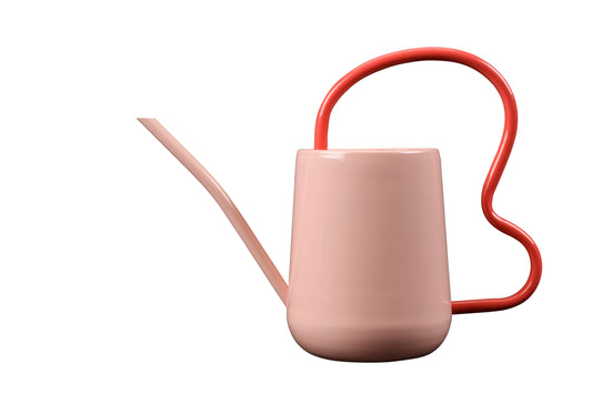 Pink watering can with red handle on a white background