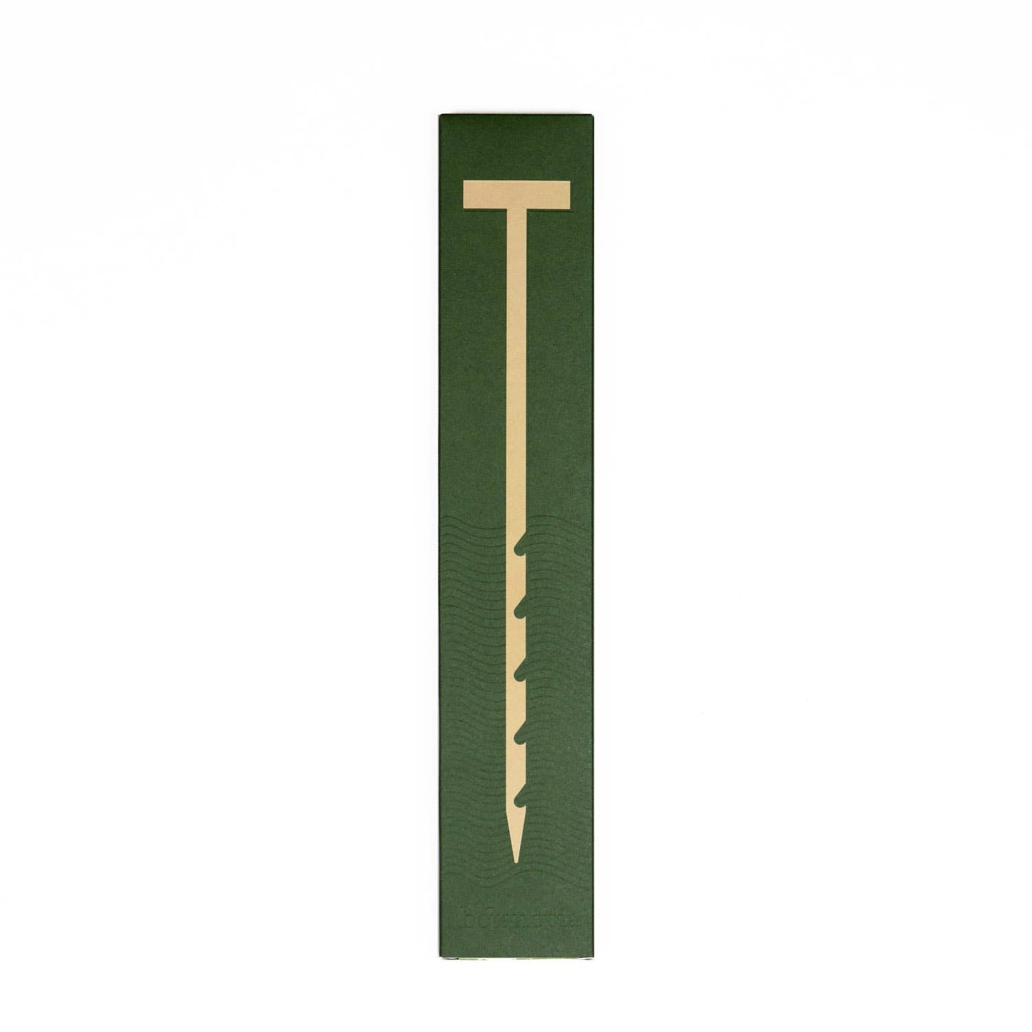 Green packaging with a beige t-shaped object on a white background