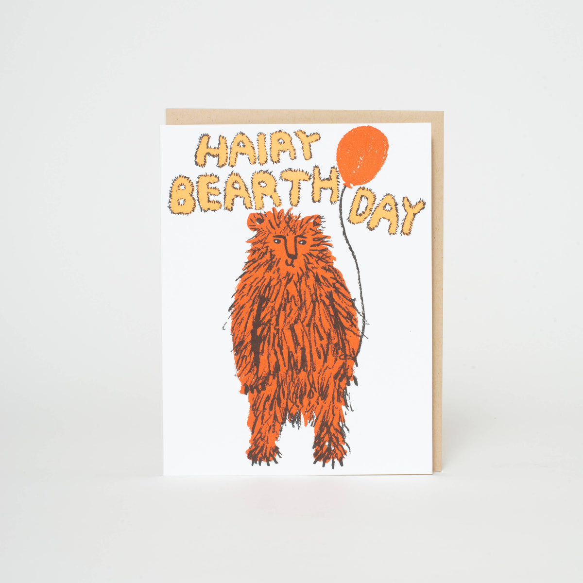Card with an orange bear illustration and 'Happy Bearthday' text on a white background