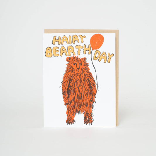 Card with an orange bear illustration and 'Happy Bearthday' text on a white background