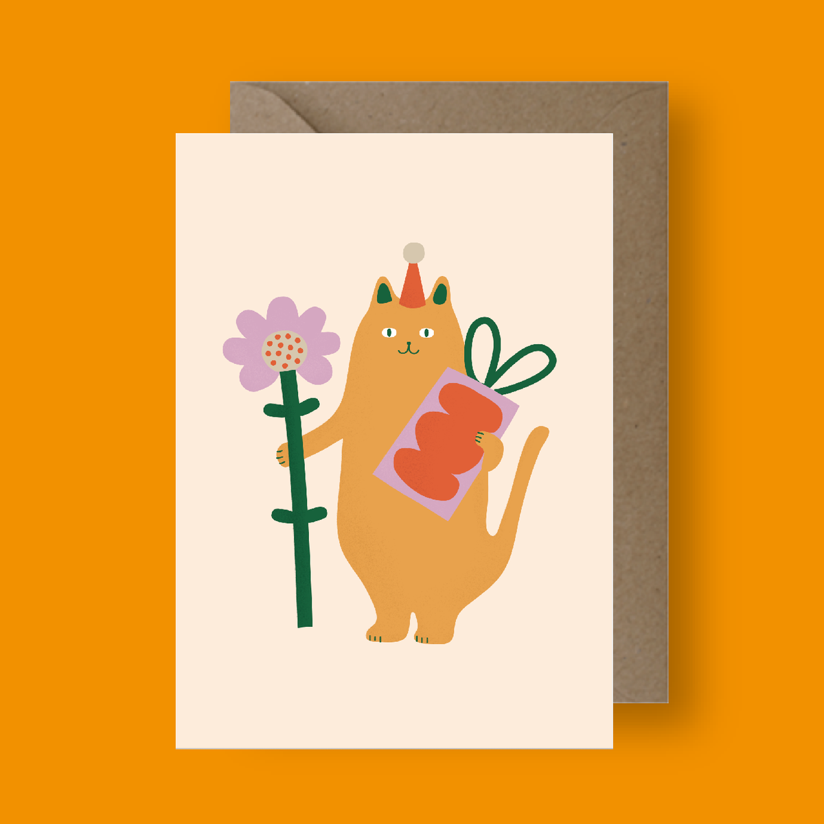 Greeting card with a cat holding a flower and carrots on an orange background
