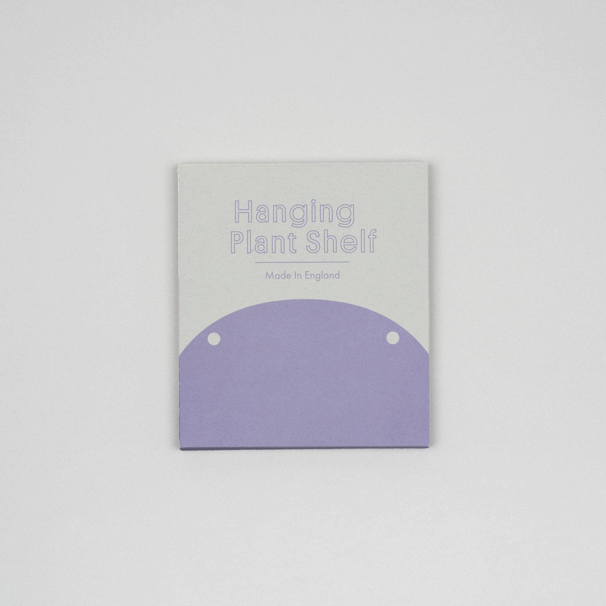 Hanging plant shelf packaging with purple shelf and gray background