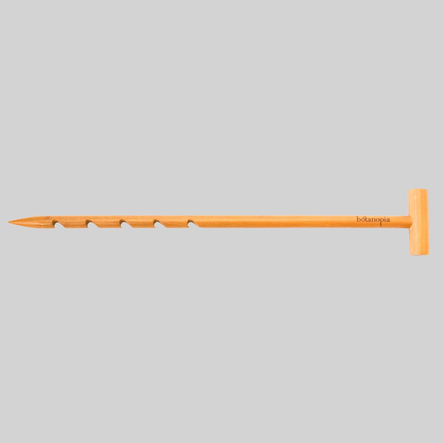 Orange garden tool with brand name on a gray background