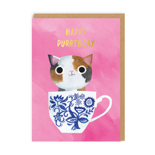 Greeting card with a cat in a teacup illustration and 'Happy Purrthday' text on a pink background