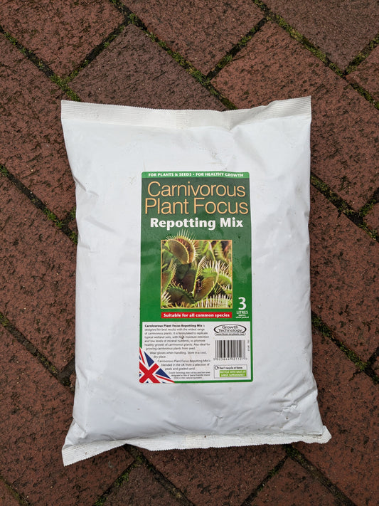 Bag of Carnivorous Plant Focus Repotting Mix on a brick surface
