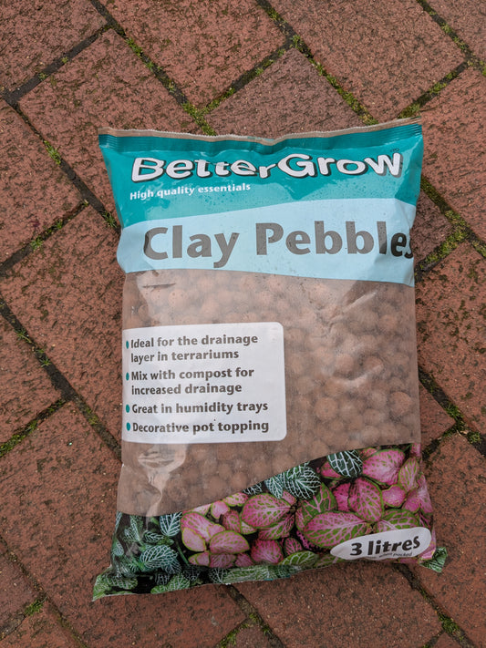 Bag of BetterGrow Clay Pebbles with product details on a brick background