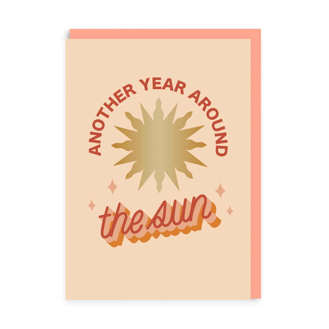 Card with sun design and text 'Another Year Around the Sun' on a beige background