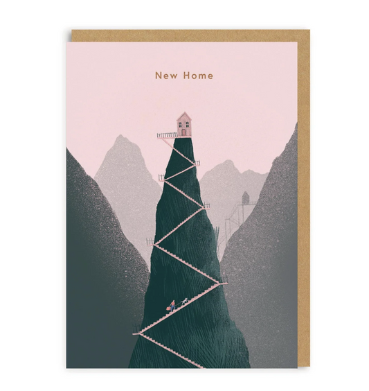 Greeting card with a lighthouse on a mountain peak and 'New Home' text on a pink background.