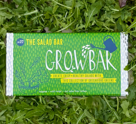 GrowBar packaging on a bed of greens
