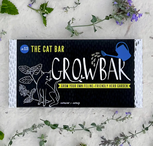 Grow Bar packaging for a feline-friendly herb garden with cat illustrations on a textured surface.