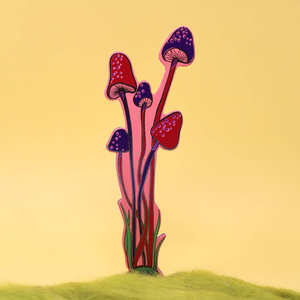 Colorful illustration of mushrooms on a yellow background