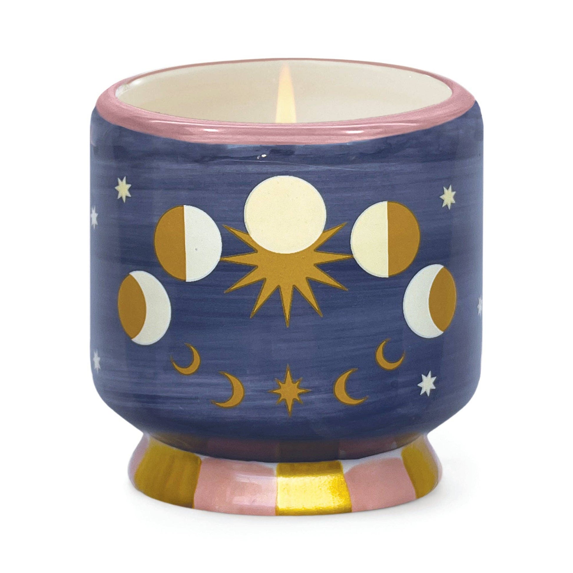 Ceramic candle holder with celestial design on a white background