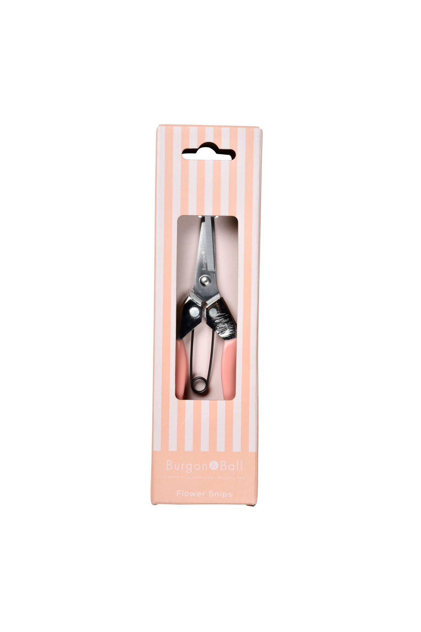 Shears in a pink striped packaging box on a white background