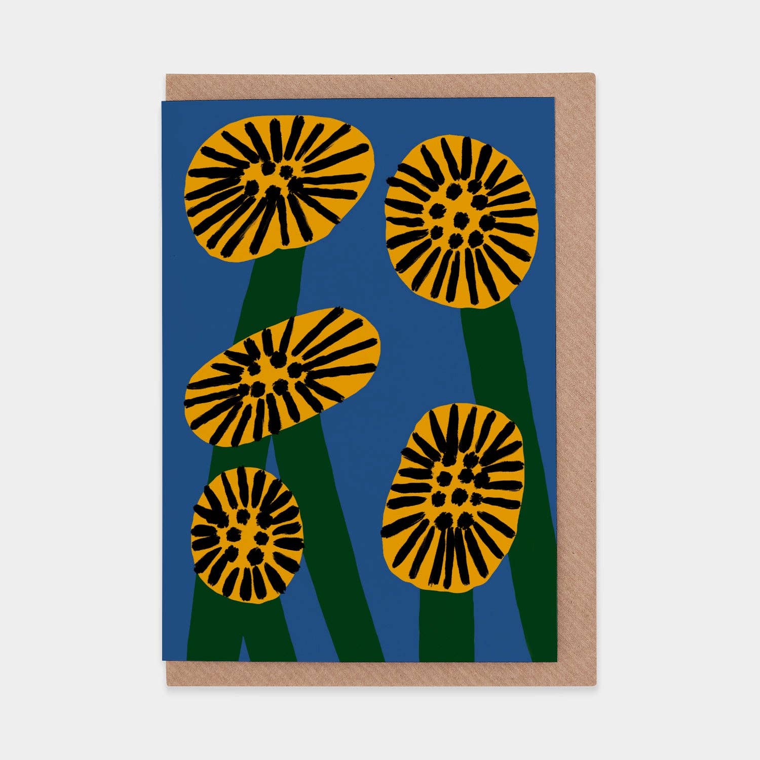 Greeting card with yellow and black floral design on a blue background
