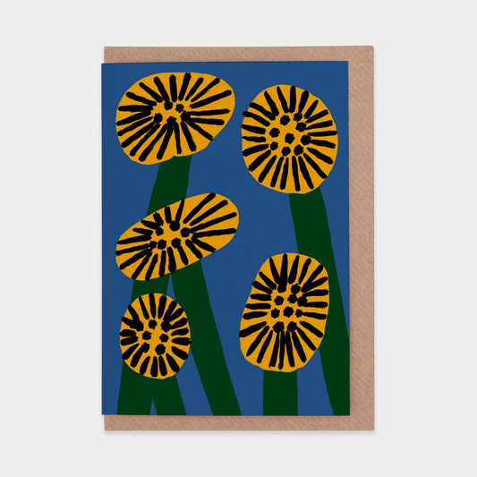 Greeting card with yellow and black floral design on a blue background