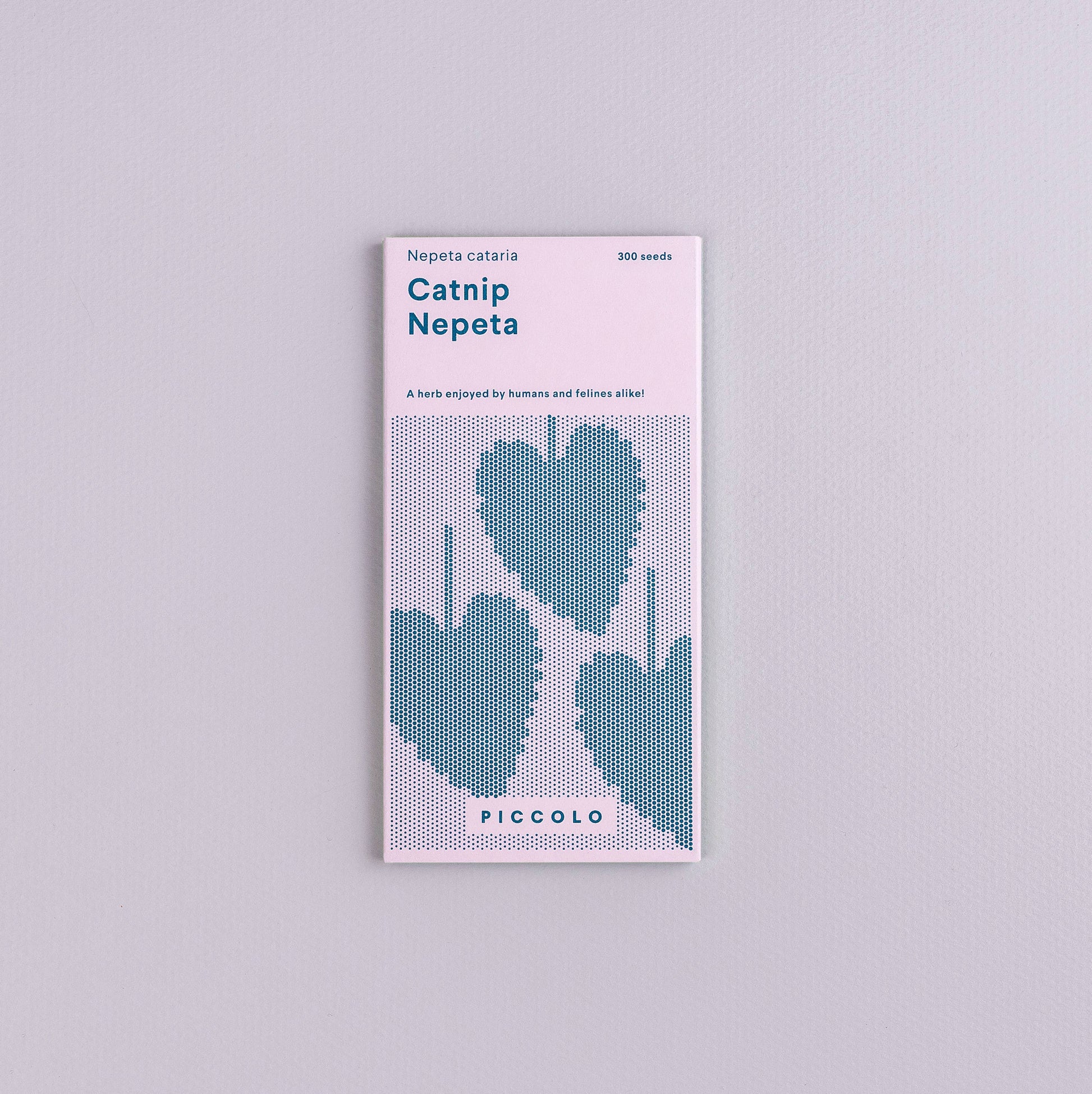 Seeds packet with blue leaf design on a light gray background